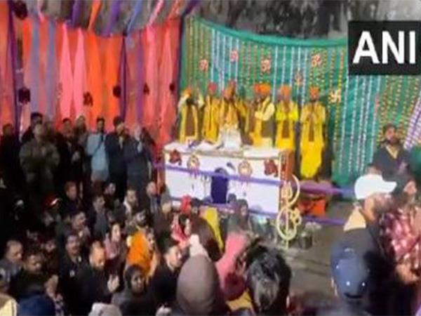 Pilgrims chant bhajans as they reach the Holy Amarnath Cave